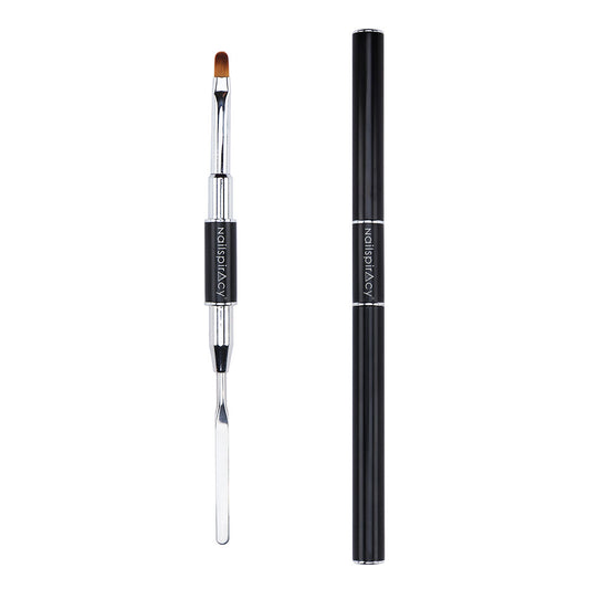 Nail brush with black handle and silver ferrule spatula on a white background